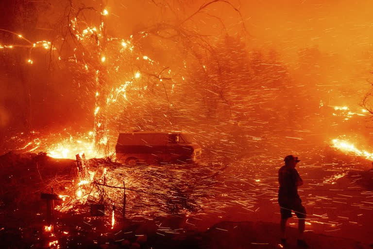 Wind fans wildfire in California canyons, residents flee