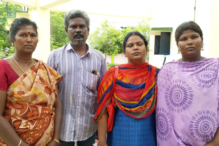 man protest with family under water tank