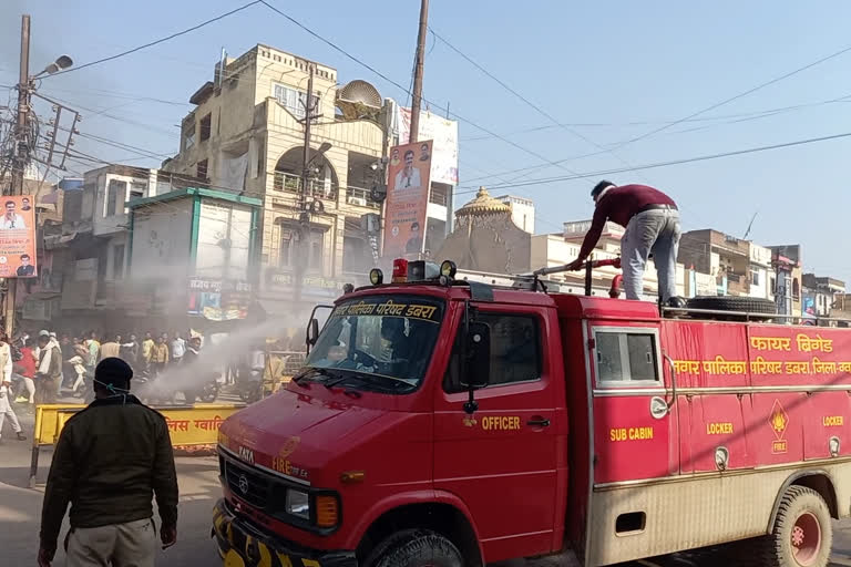 Administration showers water when agitators burnt effigy of central government on bharat bandh