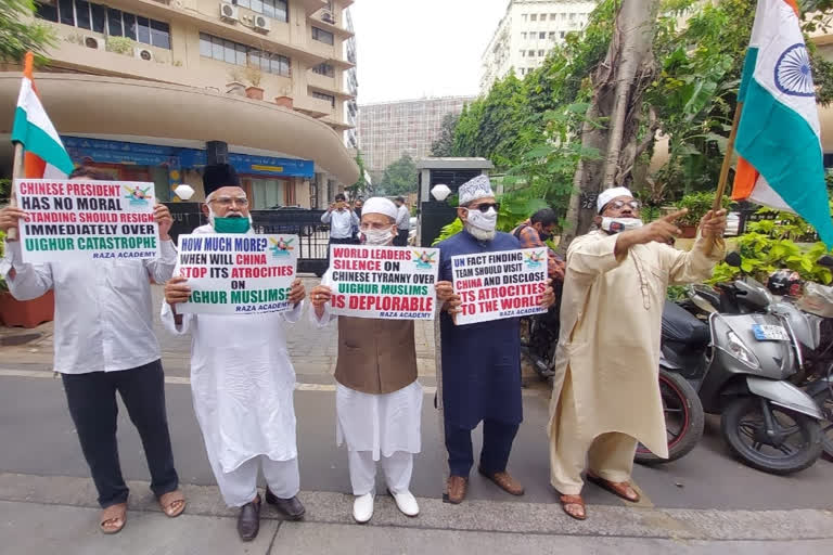 raza academe protest outside chinese counslate in mumbai