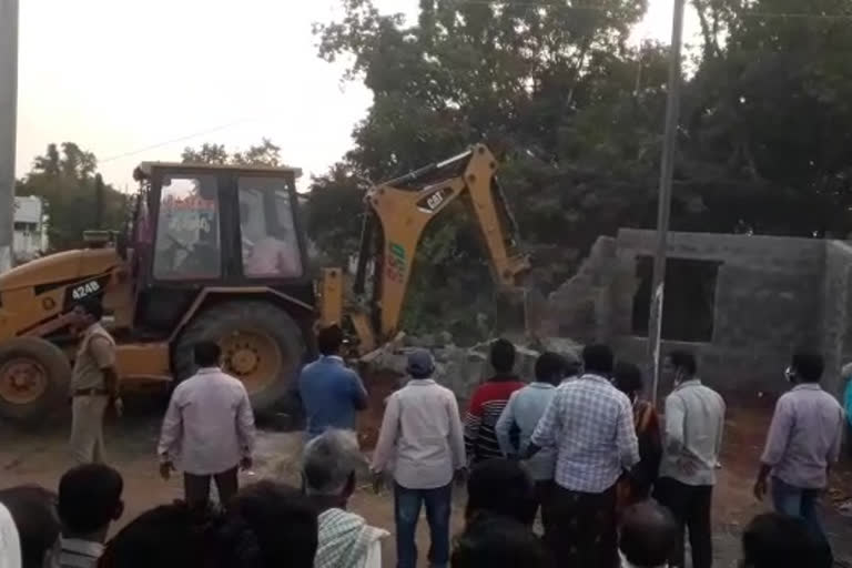 demolition of illegal buildings  at mandarada