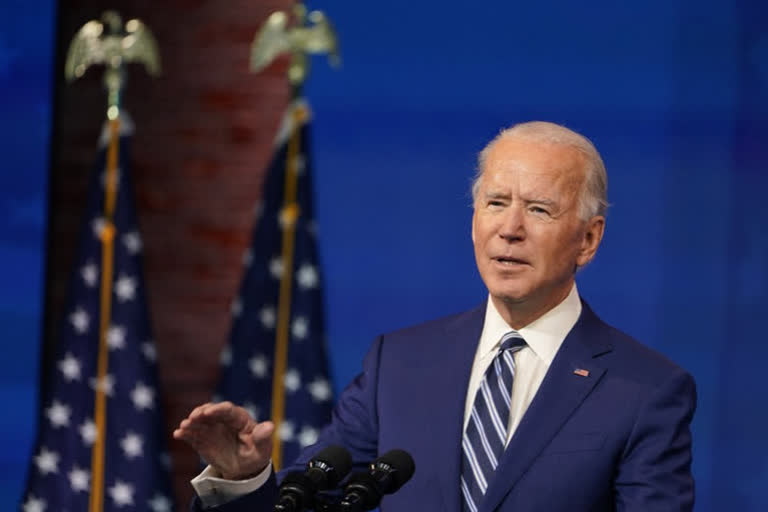 'Democracy prevailed': Biden aims to unify divided nation