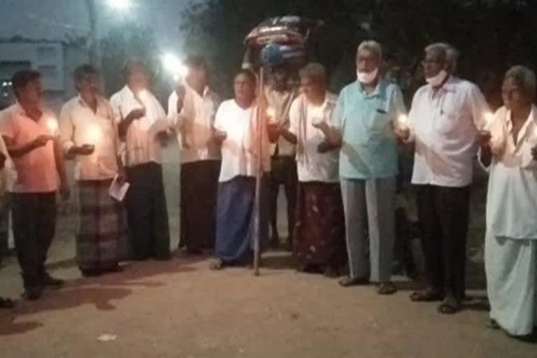 candle rally at krishna district