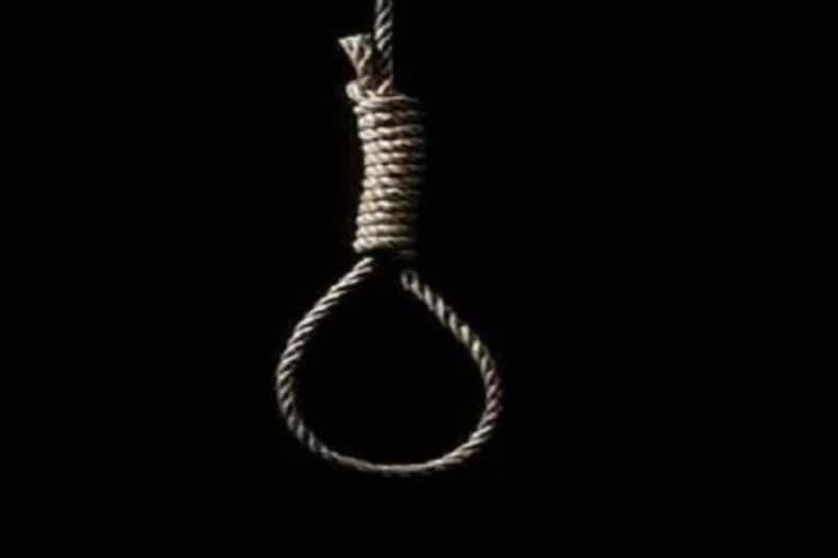 Worker harassed by debt hanged