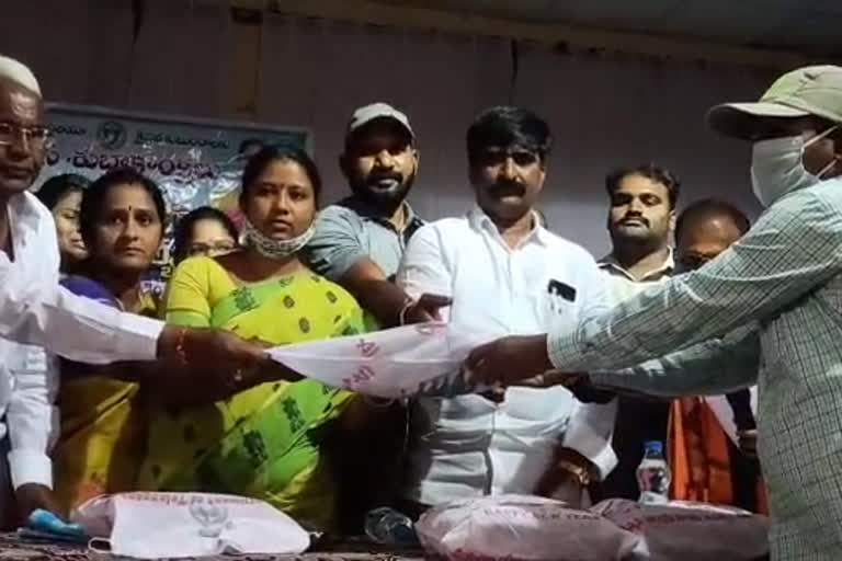 yellandu mla haripriyanayak distributed clothes for poor christians