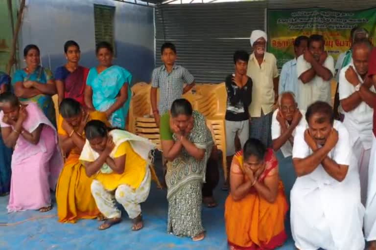 தோப்புக்கரணம் போட்ட விவசாயிகள்