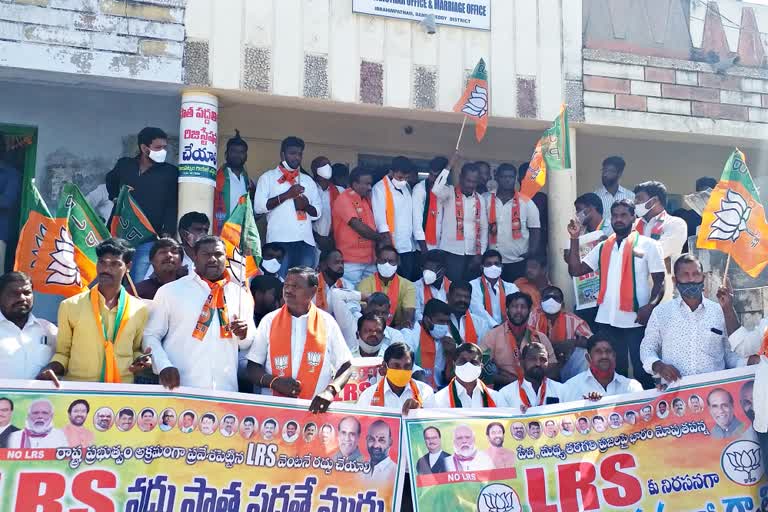 bjp leaders protest rally against lrs in ibrahimpatnam