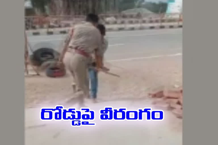 a-young-man-ran-on-the-road-for-police-beaten-with-a-stick-in-rayachoti-kadapa-district