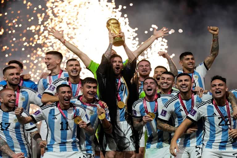 FILE - Argentina's Lionel Messi lifts the trophy after winning the World Cup final soccer match between Argentina and France at the Lusail Stadium in Lusail, Qatar, Sunday, Dec. 18, 2022.(AP Photo/Martin Meissner, File)