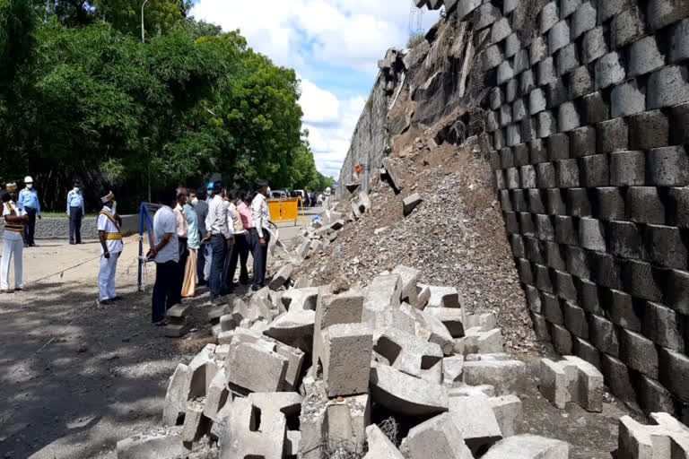 Collapsed overpass wall:  collector inspection