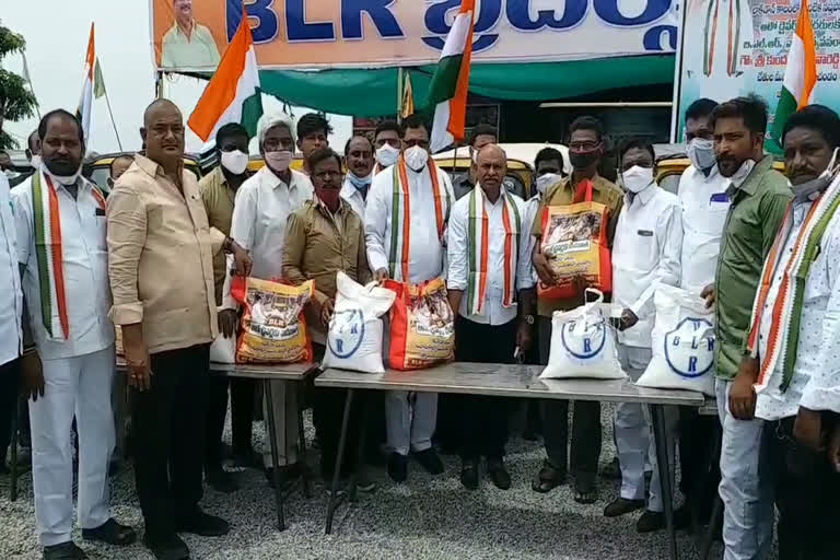 Essentials distribution to auto drivers in nalgonda district  