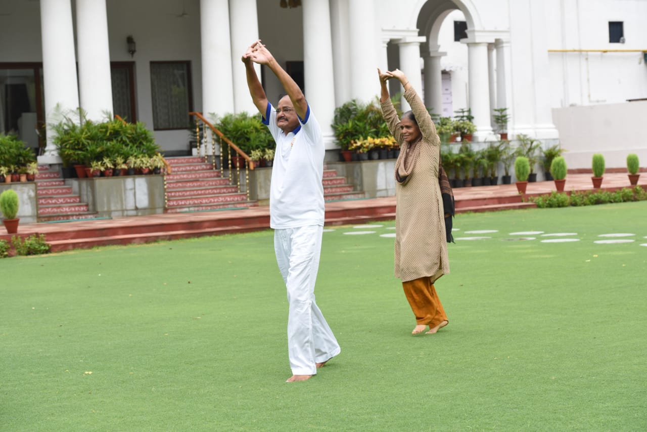 Vice president M Venkaiahnaidu participated in sixth yoga day at home with family members