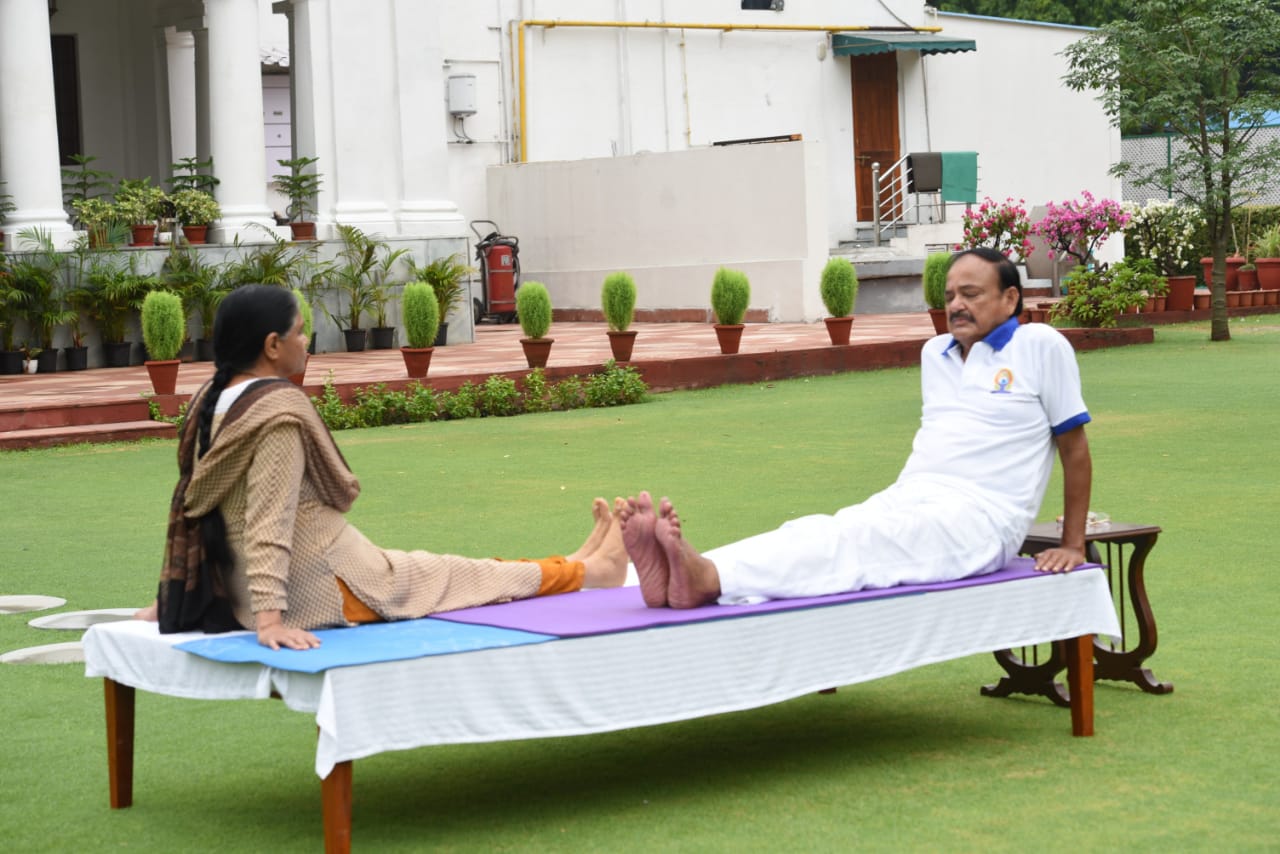 Vice president M Venkaiahnaidu participated in sixth yoga day at home with family members