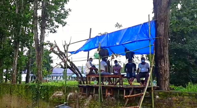 PEOPLE MOUNT ON TREE TOP HOUSE TO GUARD QUARANTINE CENTER IN ASSAM