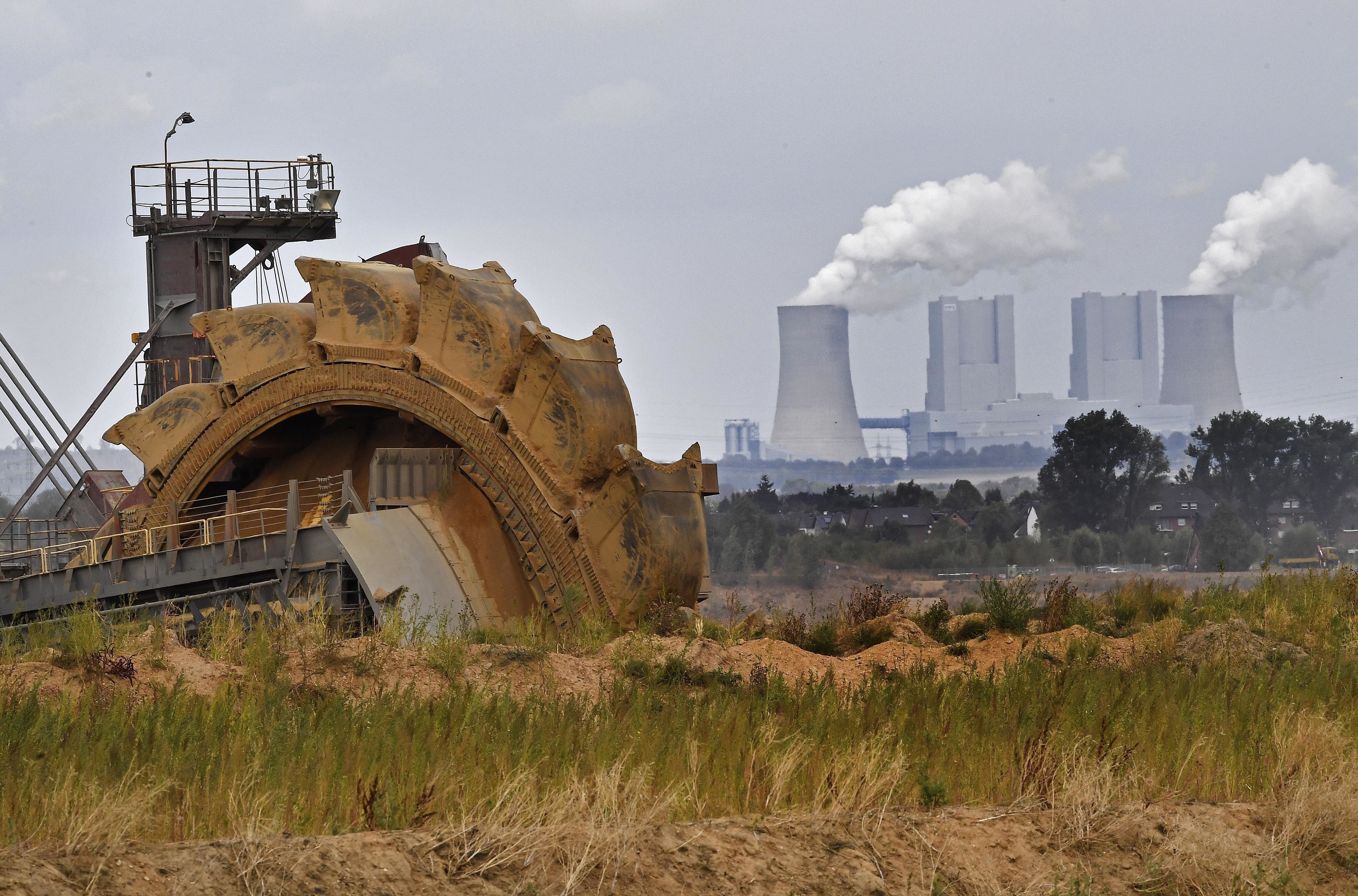 A bucket wheel digs for coal near the Hambach Forest near Dueren, Germany. Germany's greenhouse gas emissions fell sharply last year, putting the country's 2020 climate goal within reach again. (File pic)