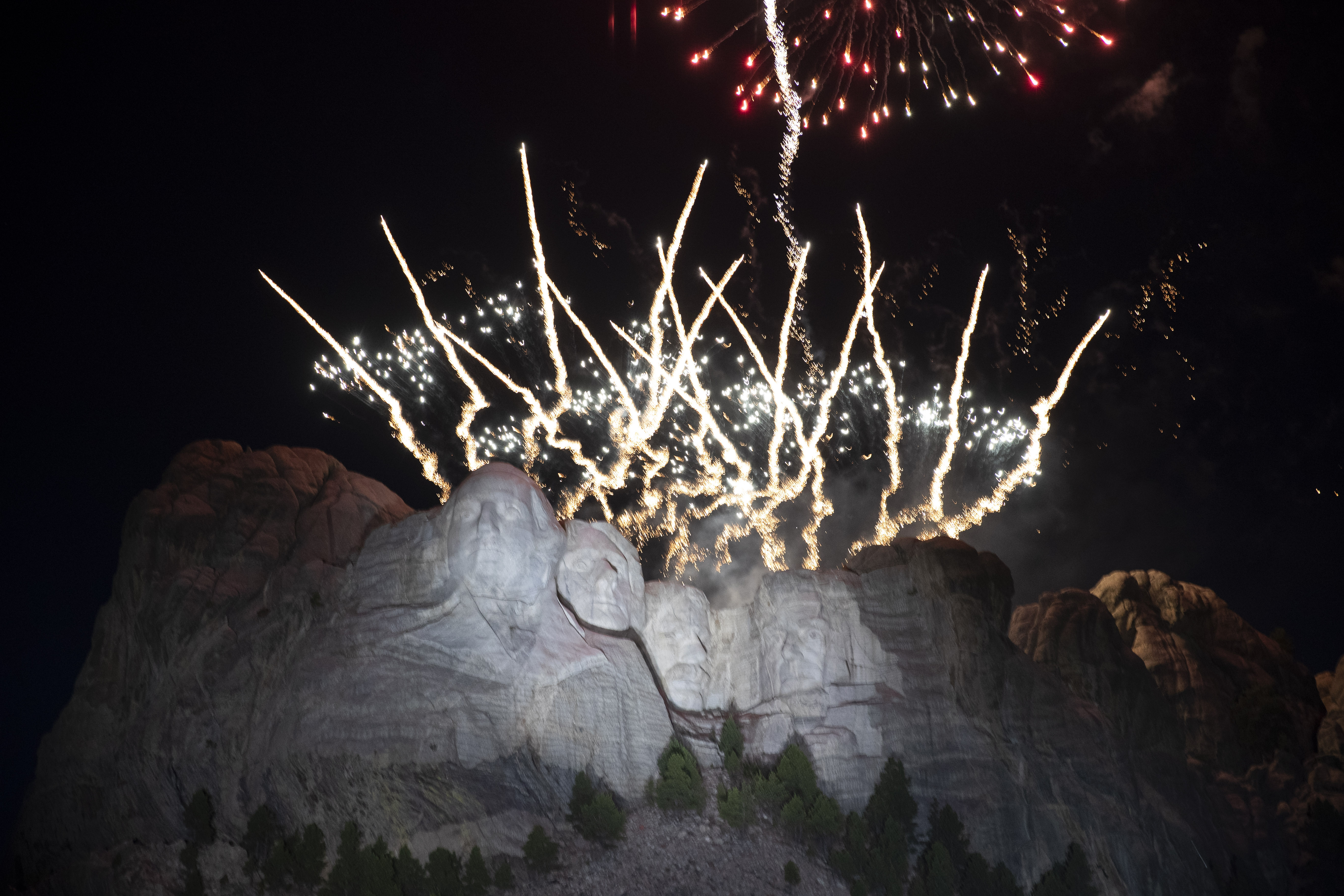 Fireworks light the sky at Mount Rushmore National Memorial, on Friday.