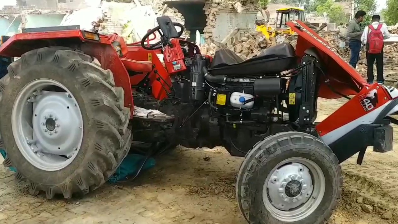 tractor demolished