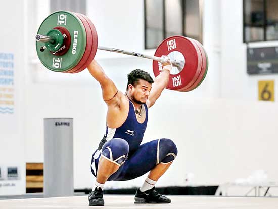 Weightlifting champion Venkata Rahul appears as a farmer on the farm.