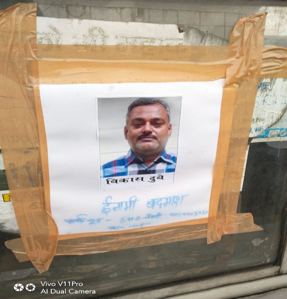 Pictures of Vikas Dubey put up at Toll Plaza