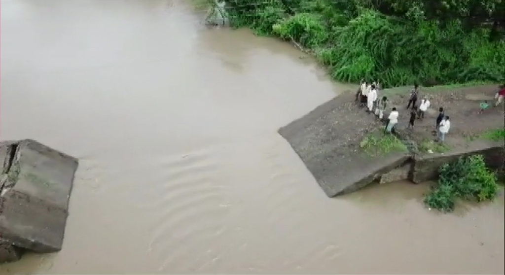 A newly-built bridge in Bamnasa village of Junagadh collapses following heavy rainfall.