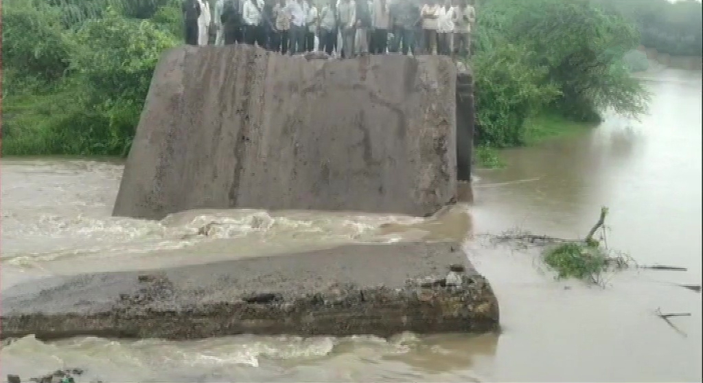 A newly-built bridge in Bamnasa village of Junagadh collapses following heavy rainfall.