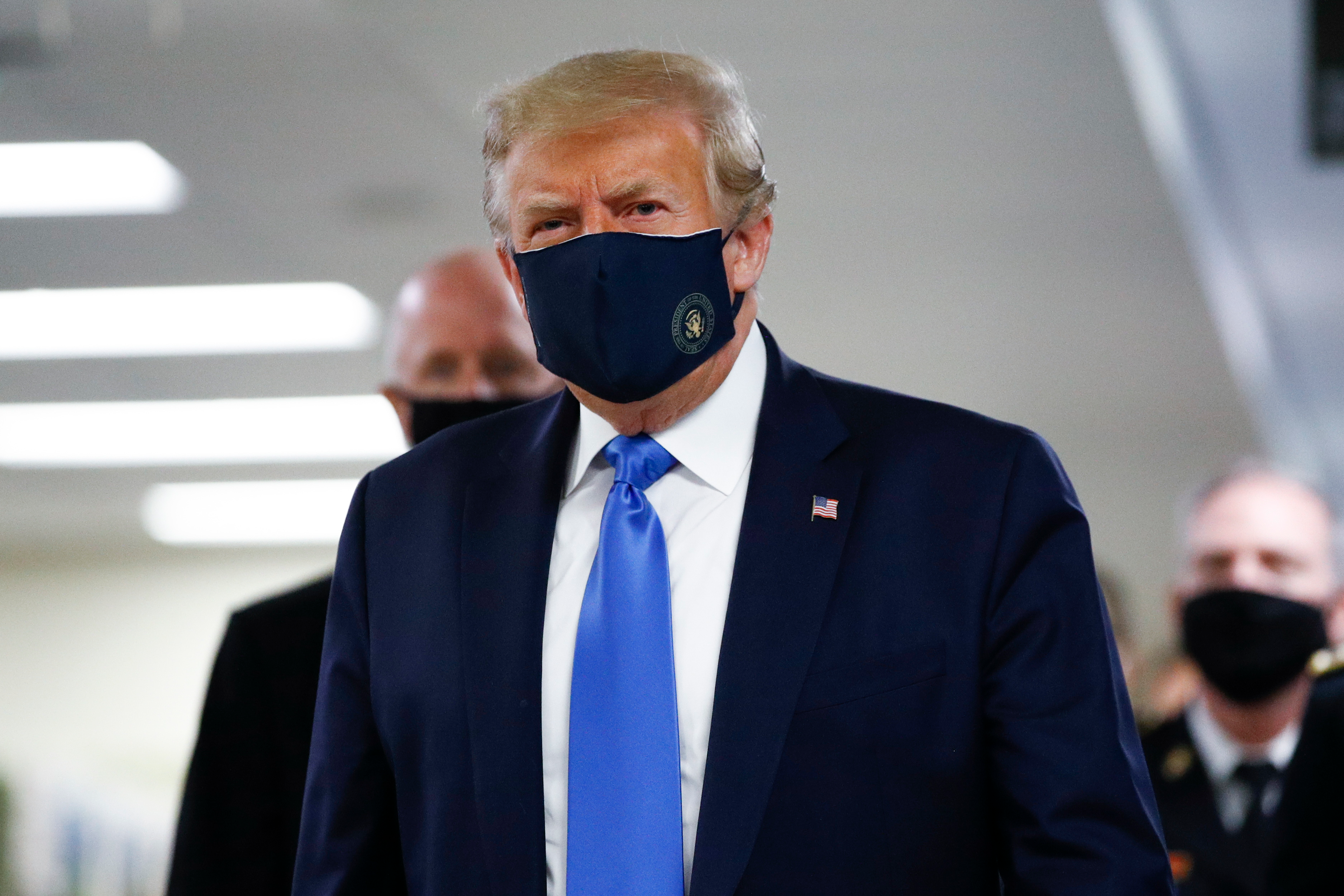 In a first, Trump dons mask as US' COVID death toll surpasses 1,34,000