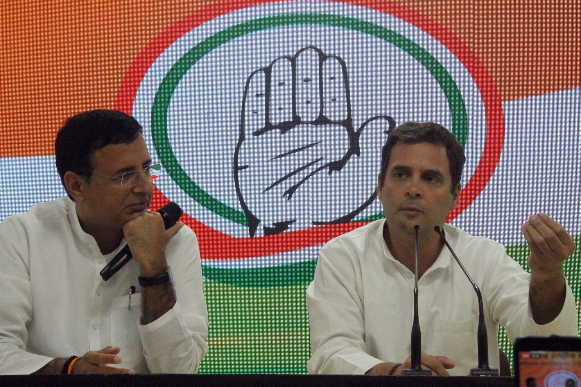 Congress leader Rahul Gandhi with party spokesperson Randeep Surjewala