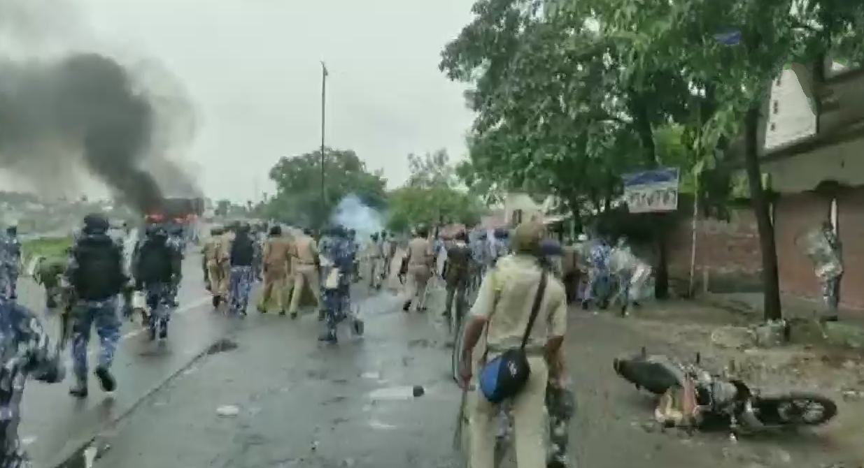 Clash breaks out between security personnel and locals, during the protest against an alleged gang-rape