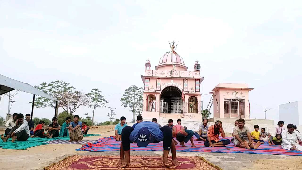 Gold medalist Premaram is giving yoga training