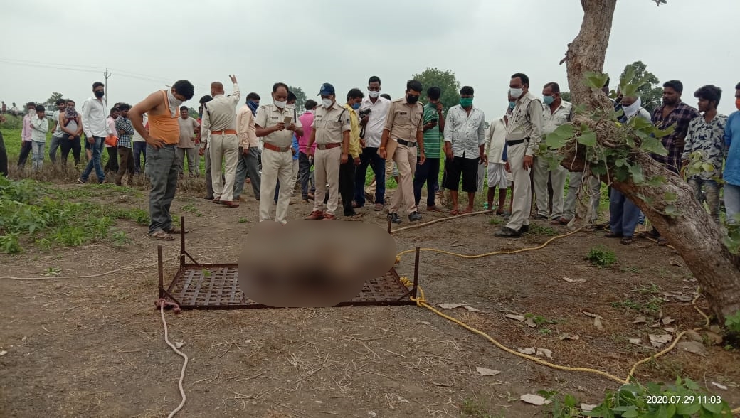 Woman's body in a well