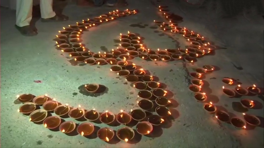 Ayodhya: People light earthen lamps on the banks of Saryu river as part of 'deepotsav'.