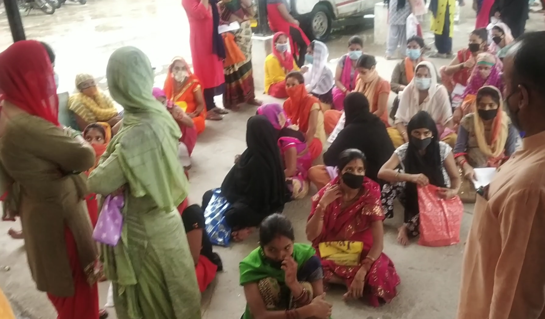 pregnant women sitting on floor