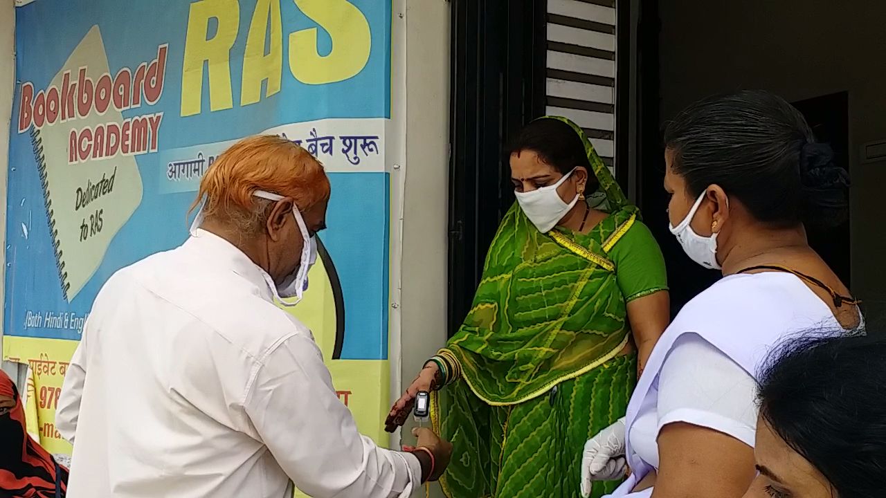 Health department team examining people