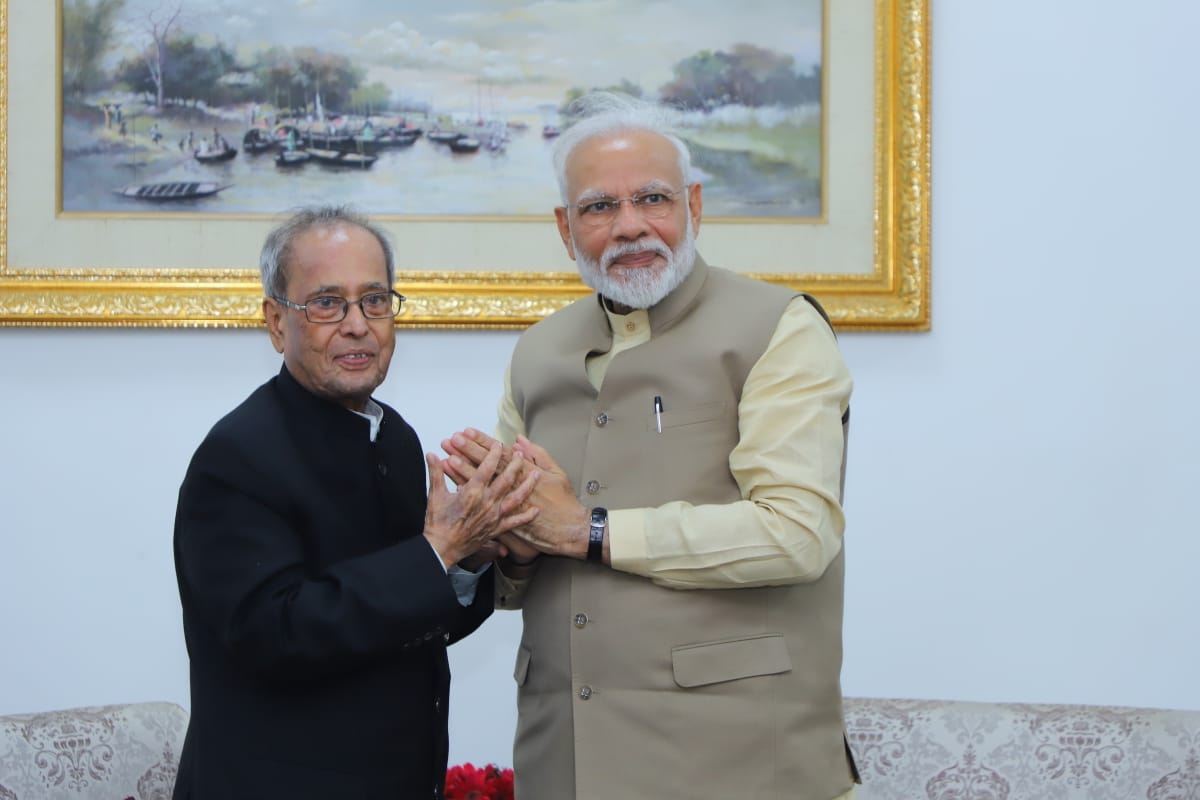 In Pic: Former President Pranab Mukherjee with PM Modi