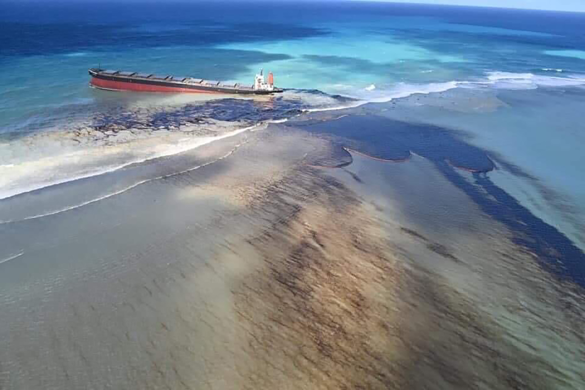 Oil leaking from the MV Wakashio, a bulk carrier ship that recently ran aground off the southeast coast of Mauritius, on Monday.