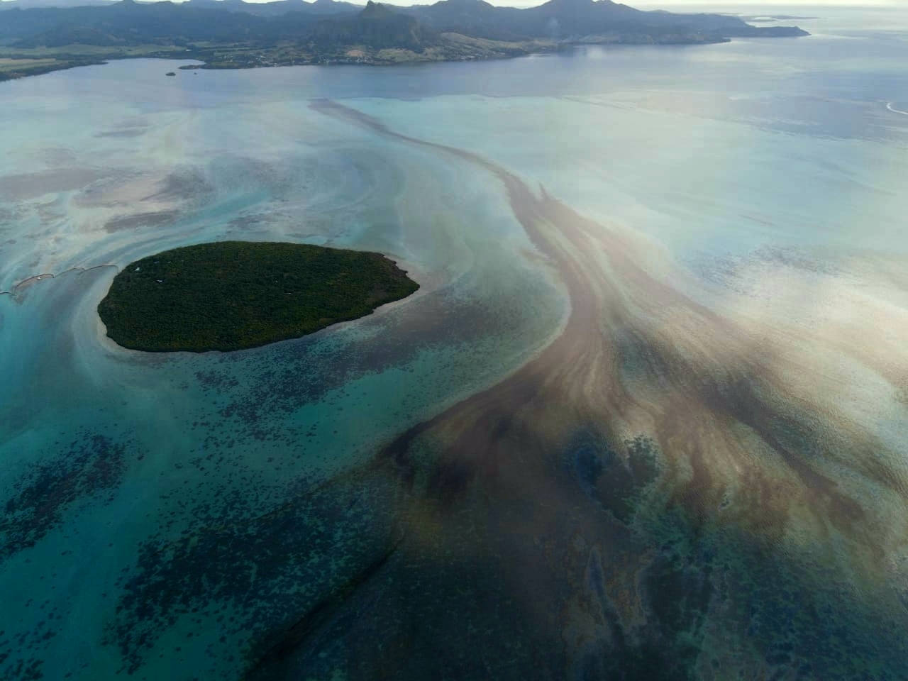 Oil leaking from the MV Wakashio, a bulk carrier ship that recently ran aground off the southeast coast of Mauritius, on Monday.