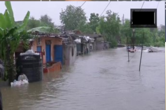 Normal life disrupted in Bhopal's Dam Kheda due to the prevailing flood situation, following heavy rainfall in the area.