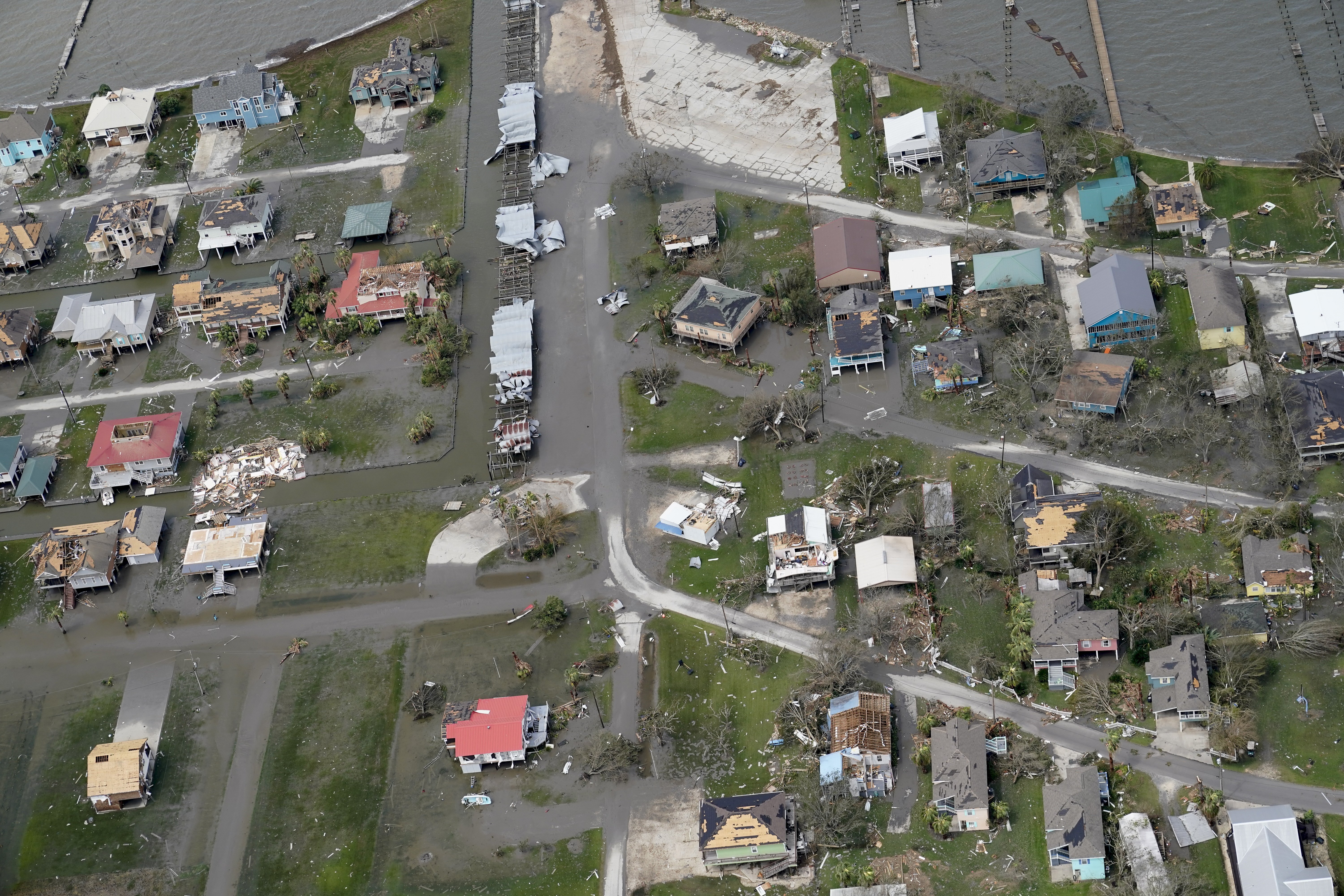 Buildings and homes are flooded in the aftermath of Hurricane Laura on Thursday near Lake Charles.