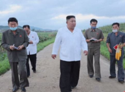 Kim Jong Un visits area hit by Typhoon Bavi