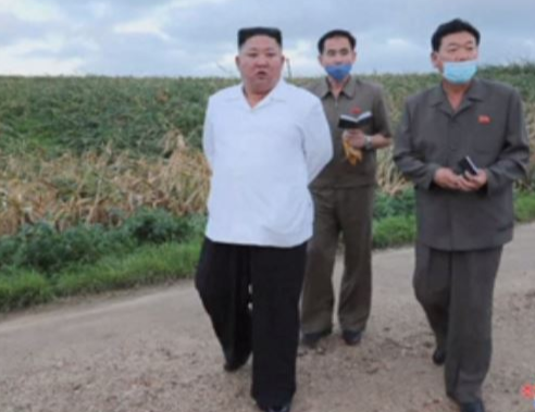 Kim Jong Un visits area hit by Typhoon Bavi