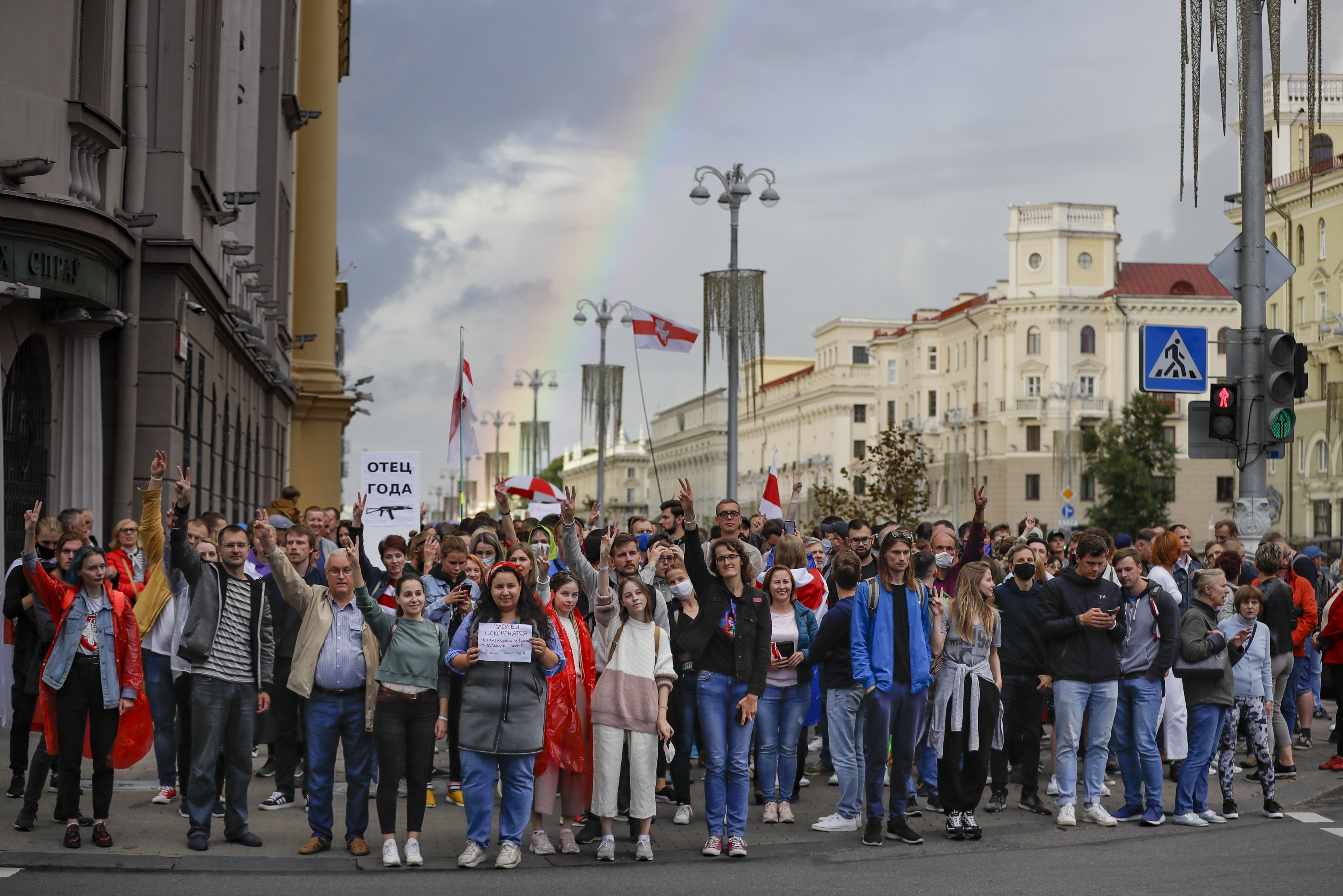 Protesters shout as they walk toward Independence Square in Minsk, Belarus, Thursday.