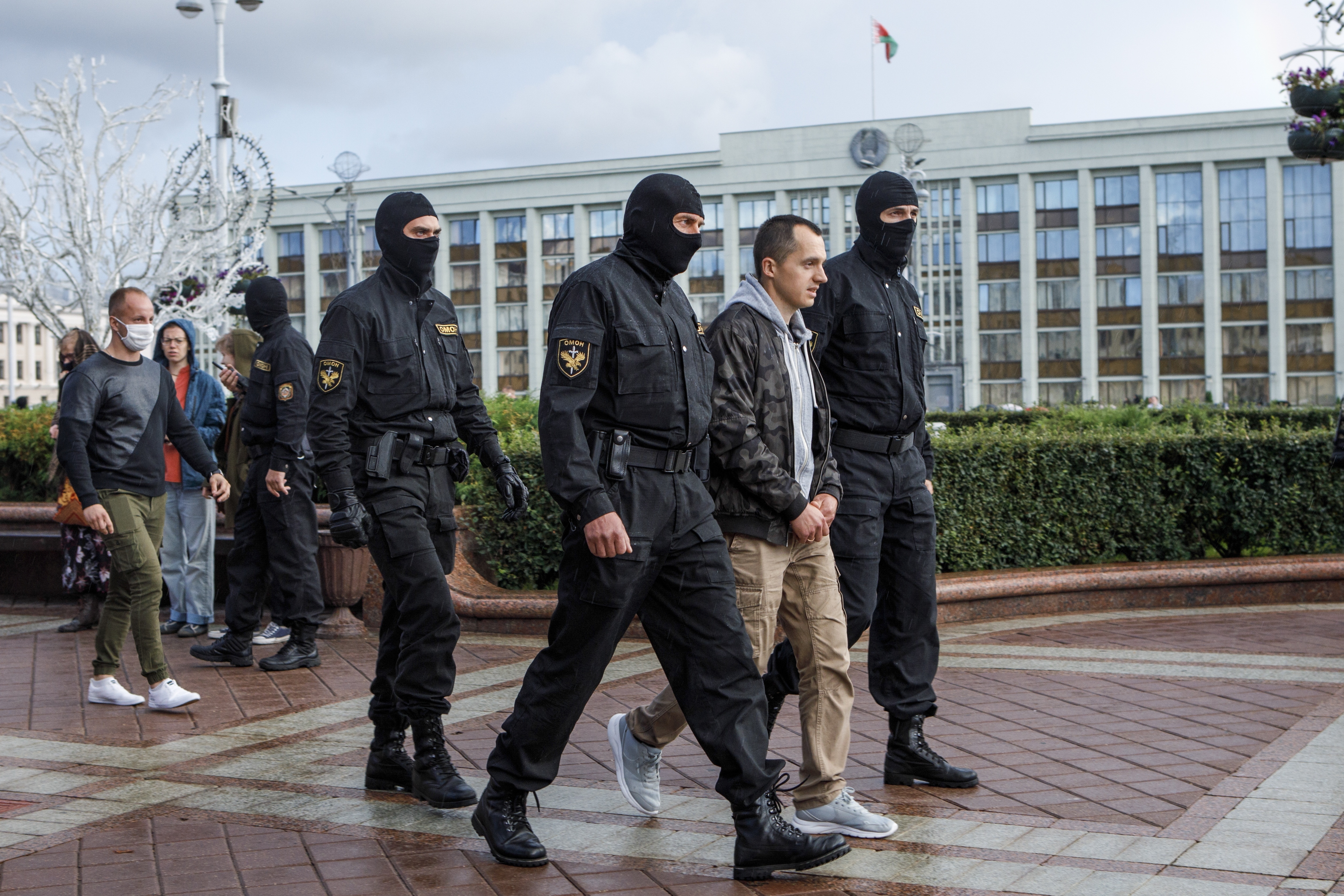 Riot police detain a protesters at Independence Square in Minsk, Belarus, Thursday.