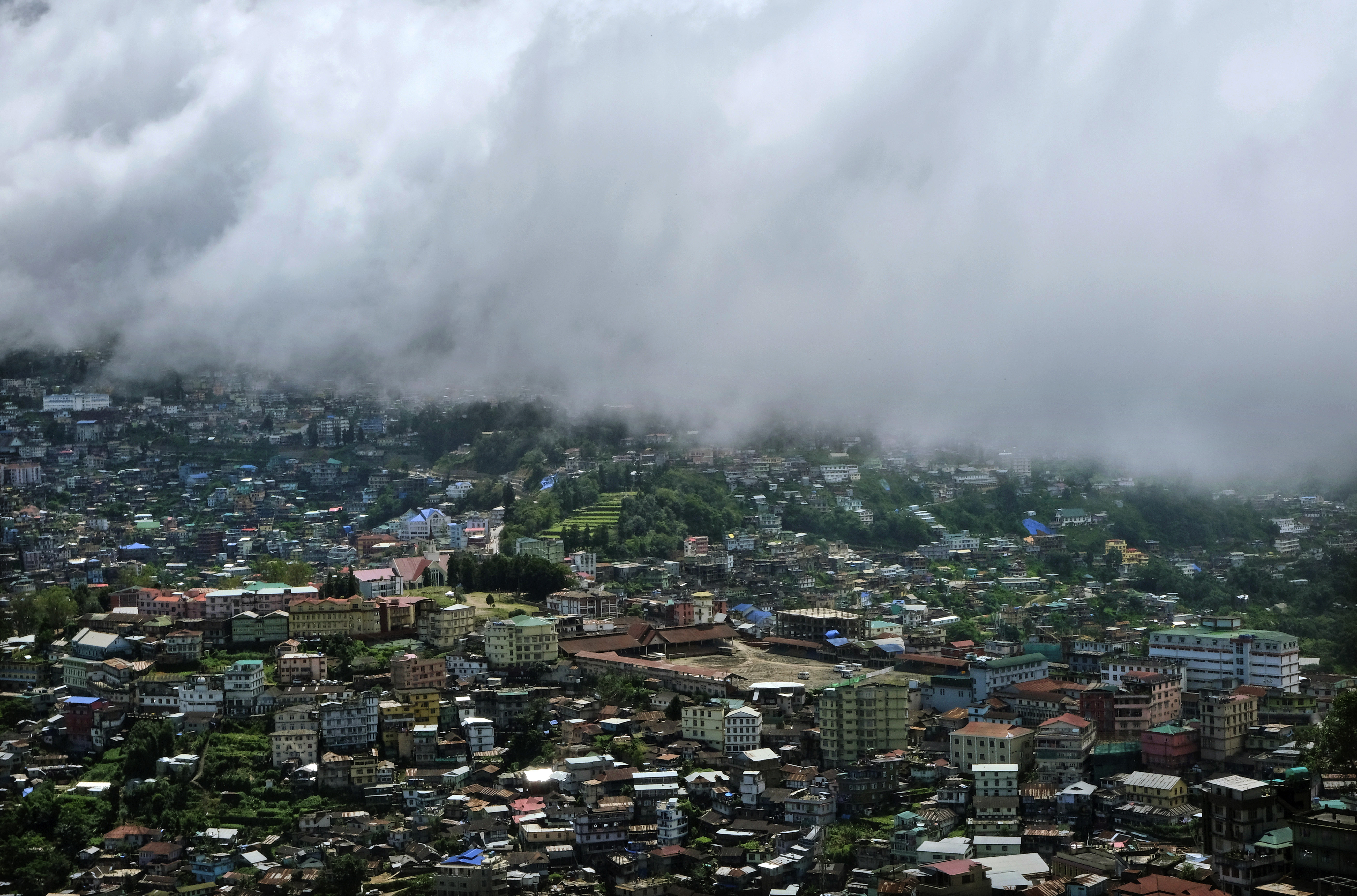 Monsoon clouds form a border over Kohima War Cemetery, green terraced lawns in center, and the area which was the main site of a bloody battle in 1944 between the Japanese and British Commonwealth forces in Kohima.(File)