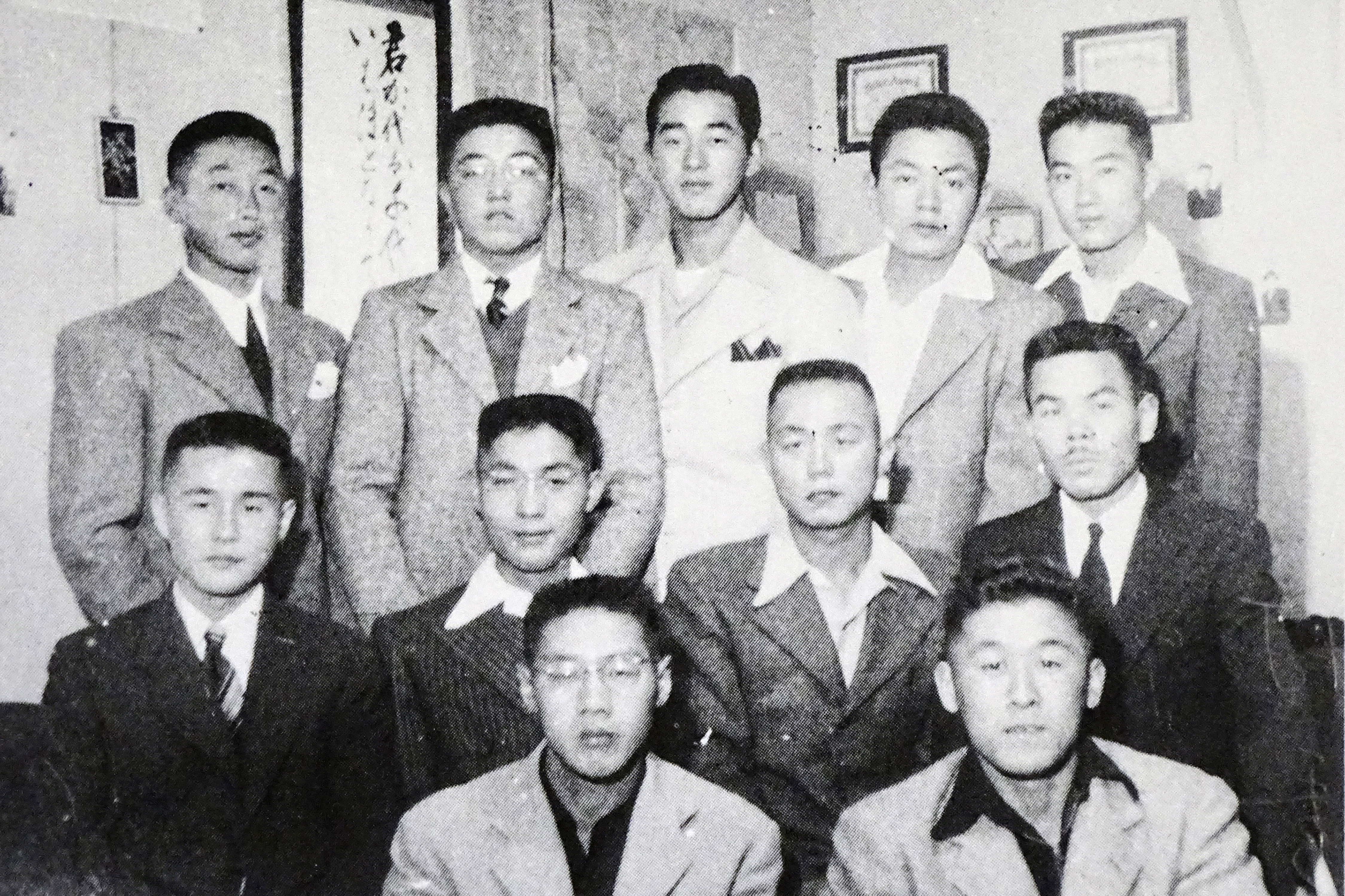 In this 1944 photo provided by Hidekazu Tamura, Tamura, second from right in center row, poses with his youth league group at Tule Lake concentration camp at southeast of Phoenix during the pacific war period.