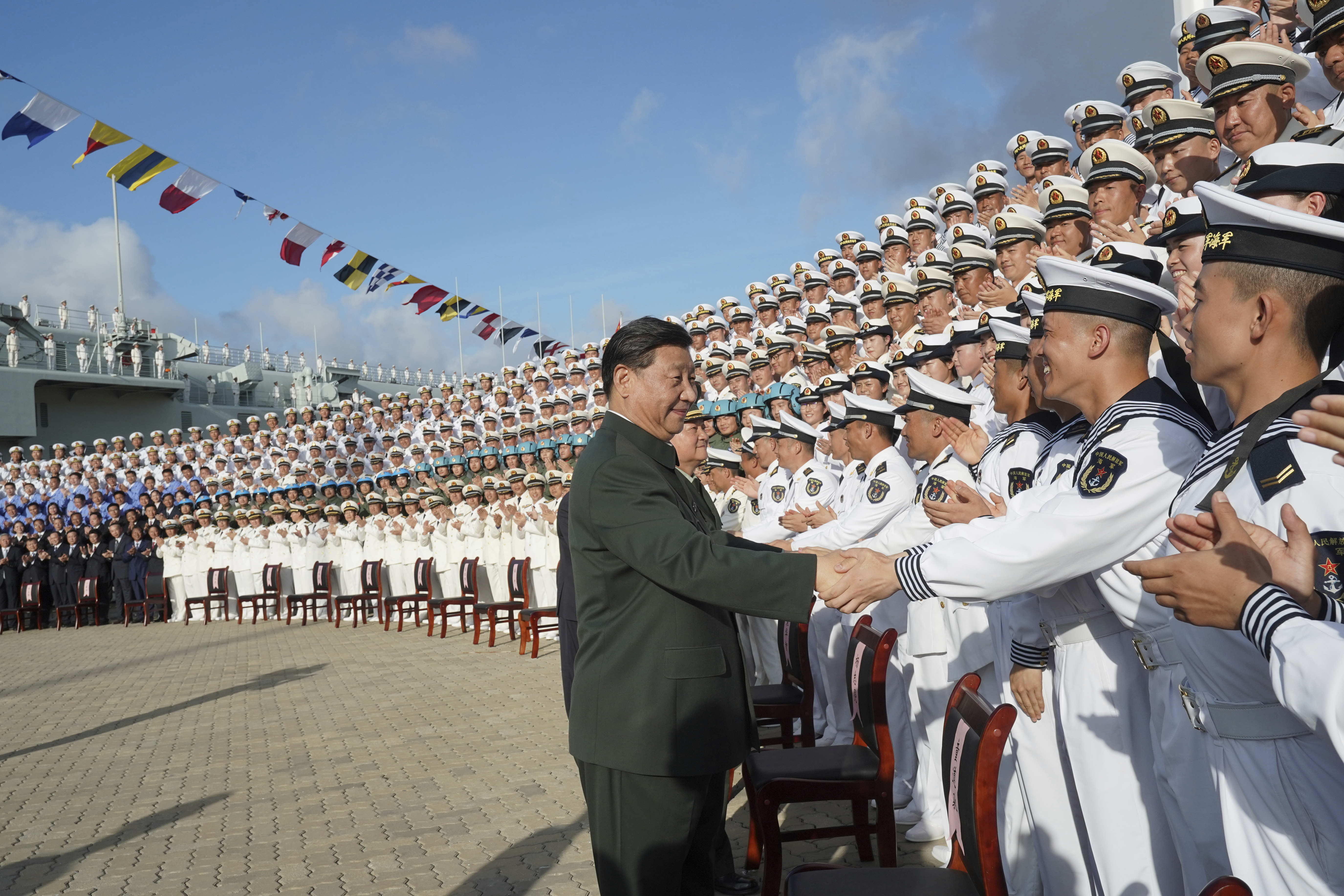 Chinese President Xi Jinping meeting with representatives of the aircraft carrier unit and the manufacturer at a naval port in Sanya, southern China's Hainan Province. (File)