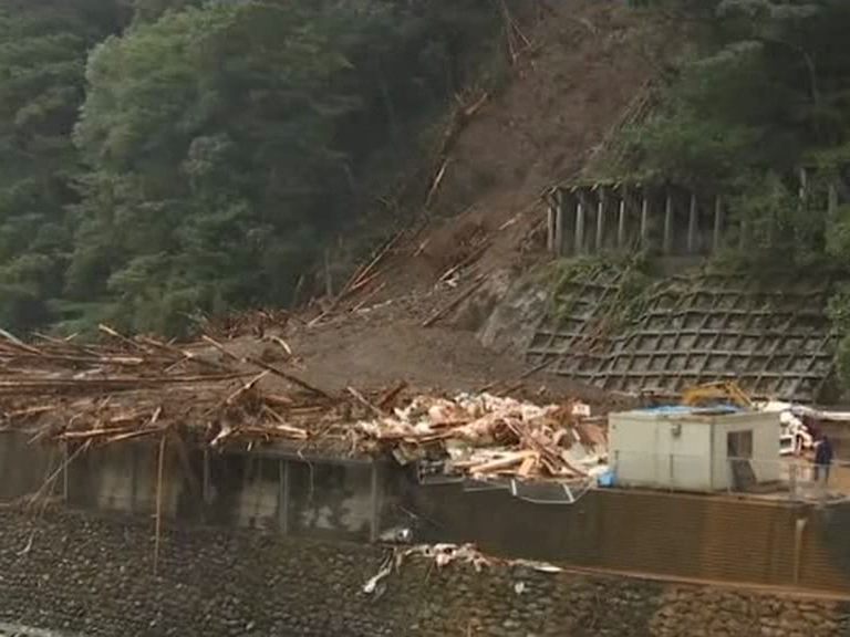 second powerful typhoon to slam Japan in a week damaged buildings