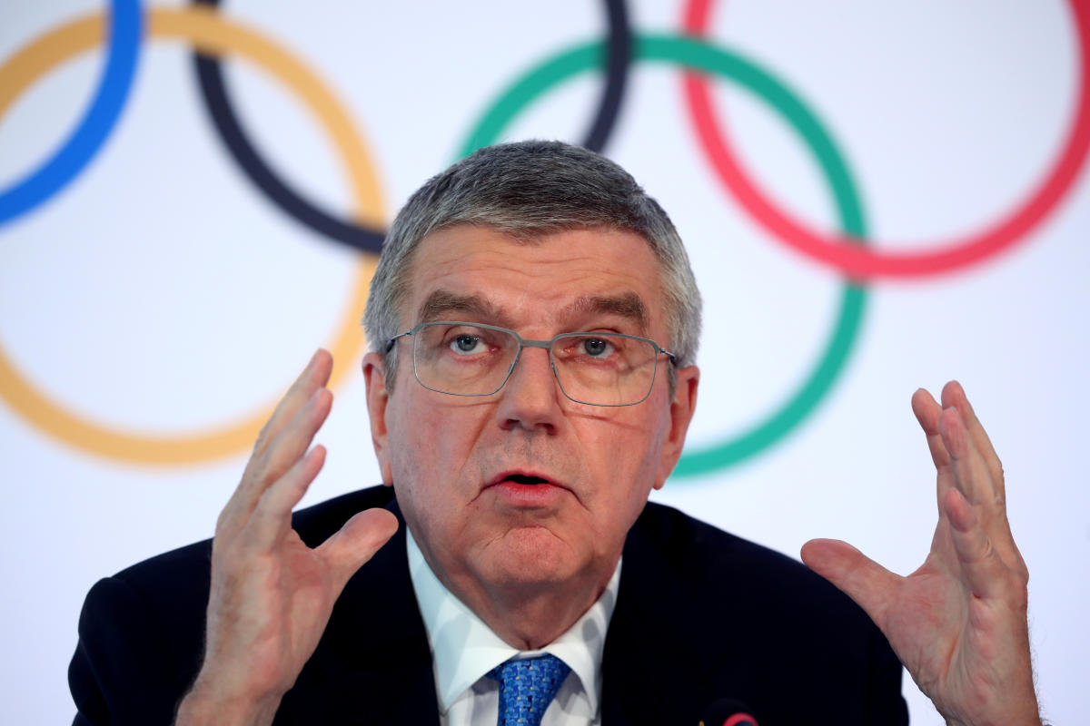 Japan committed to organizing Olympics next year says Suga