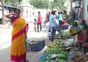 People gather at a market