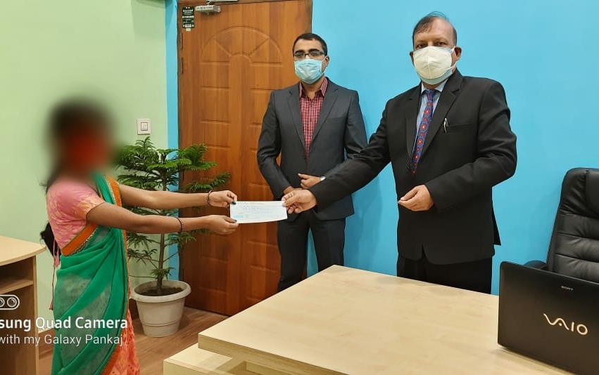 Ceremonial Cheque Distributes Two victim By DLSA In Diphu