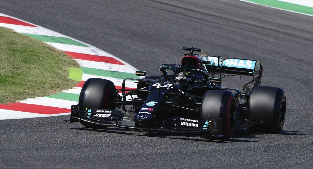 F1: lewis hamilton eyes michael schumacher's record, wins tuscan grand prix